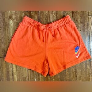 Nike DNA Shorts Women’s Size Medium. Bright orange. Multicolor Nike Logo. NWOT